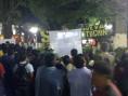 Crowds in central square watch video and listen to testimony from Activists about the 'Water War'